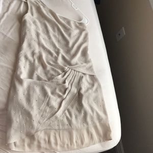 Only worn once at a wedding for 4 hours